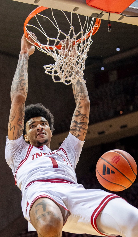 Indiana's Kel'el Ware (1) dunks during the first half of the Indiana versus Marian men's basketball game at Simon Skjodt Assembly Hall on Friday, Nov. 3, 2023.